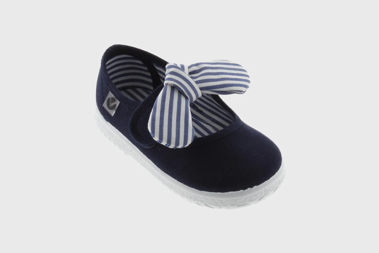 Navy canvas mary jane with striped bow